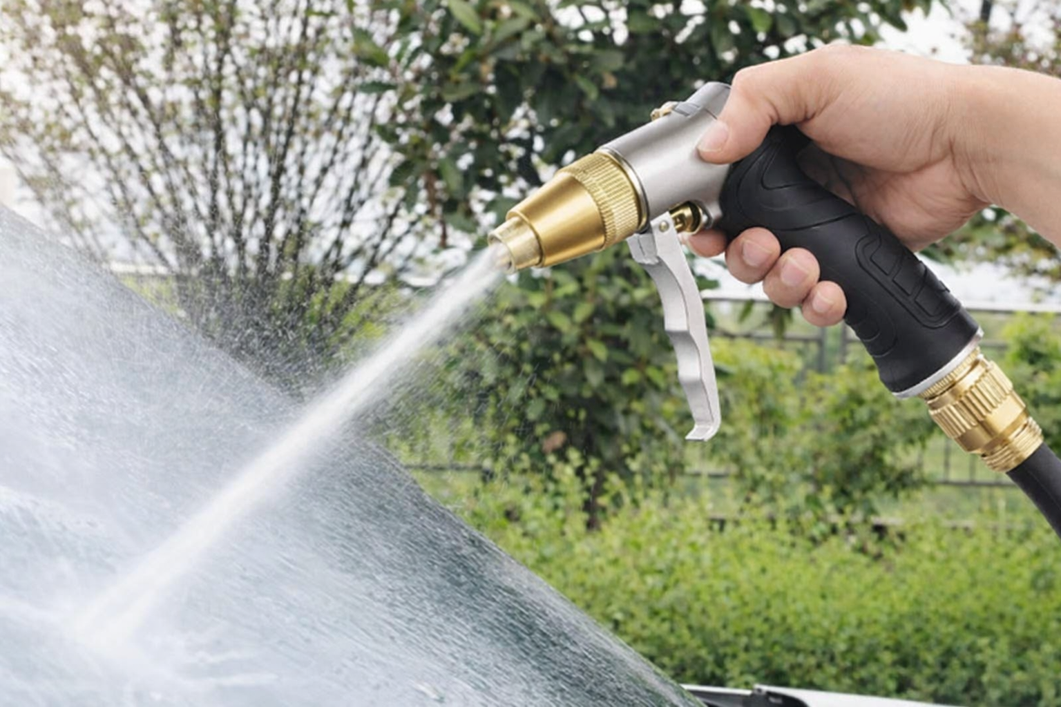 Homeowner experiencing back pain while manually scrubbing deep stains, highlighting the need for a PowerJet cleaning tool